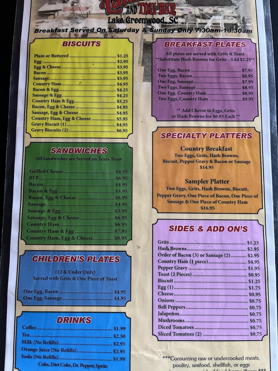 Printed menu showing salads and chicken dishes.